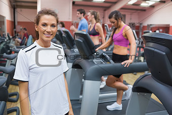 Woman smiling in the gym