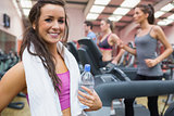 Woman happy in the gym after exercise