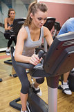 Woman training in a spinning class