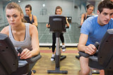 Five people at spinning class