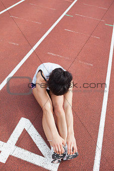 Runner stretching legs