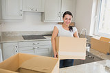Young woman unpacking