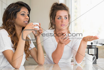 Girls chatting over coffee