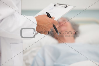 Doctor holding clipboard
