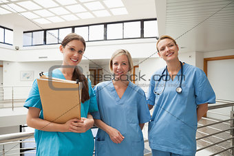 Three nurses in stairwell