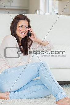 Woman smiling while calling