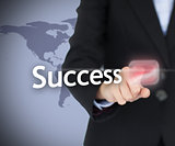 Businesswoman touching on the success button