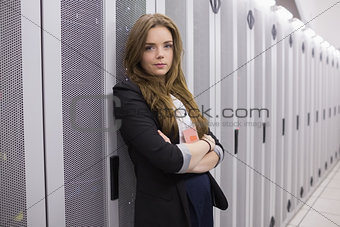 Female worker in data storage facility