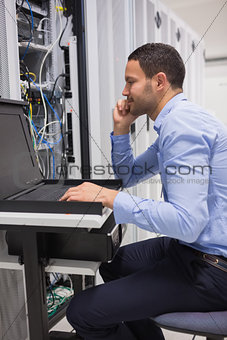 Man repairing the servers