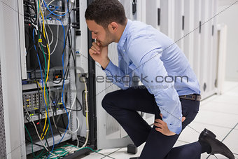 technician checking server