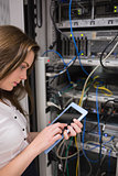Concentrated woman doing data storage