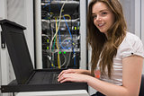 Smiling woman searching through servers