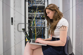 Female technician doing data storage