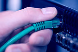 USB cable being inserted into server
