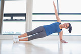 Happy woman in yoga pose