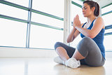 Women meditating in sitting yoga pose