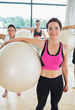 Happy group with exercise balls