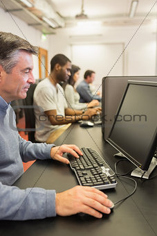 Man in computer class