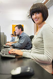 Happy woman in computer class