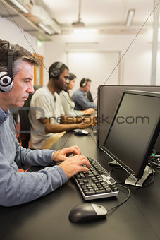 Man working in computer class