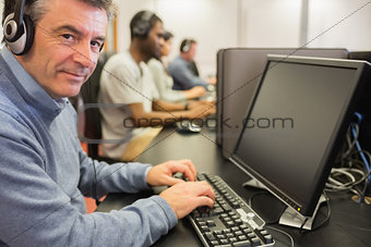 Mature student in computer class