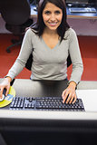 Smiling woman in computer class