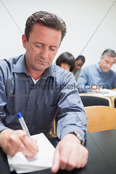 Man taking notes