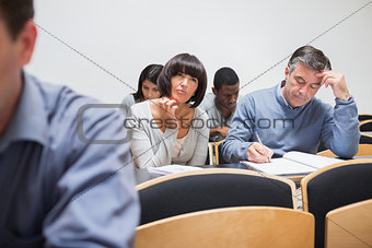Students sitting in the class and thinking
