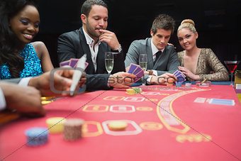 Happy people playing poker