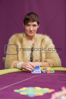 Angry woman at poker table