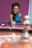 Woman playing roulette