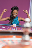 Woman winning at roulette table