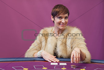 Woman stacking chips in a casino