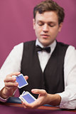 Dealer shuffling cards in a casino