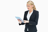Blonde woman touching on her tablet
