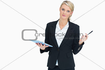 Woman holding tablet and pen