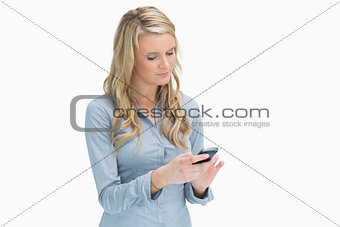 Woman texting with her smartphone