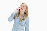 Woman laughing while calling