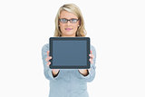 Woman presenting her tablet