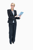 Smiling businesswoman using tablet pc
