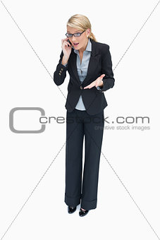 Business woman having argument on phone