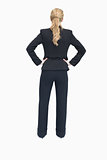 Businesswoman standing with back facing