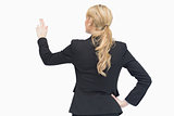 Standing businesswoman pointing something