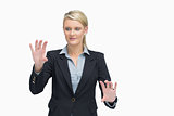 Businesswoman presenting with both hands