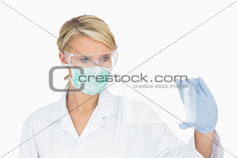 Surgeon analysing clear pane