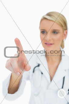 Female doctor touching on something