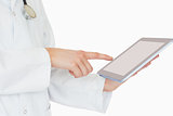Doctor pointing on a tablet pc