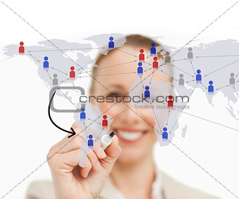 Woman linking figures on world map