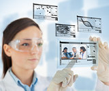 Laboratory technician selecting images