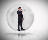 Businessman standing at a bubble